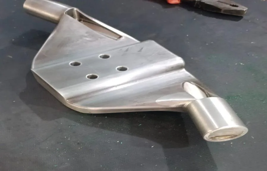 Fabricated and machined metal bracket